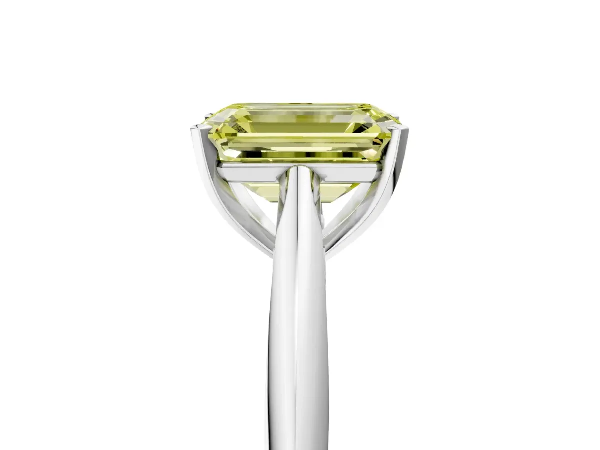 Fancy Yellow Emerald Cut Diamond Solitaire Engagement Ring with Cathedral Setting and Four-Prong Mount White gold