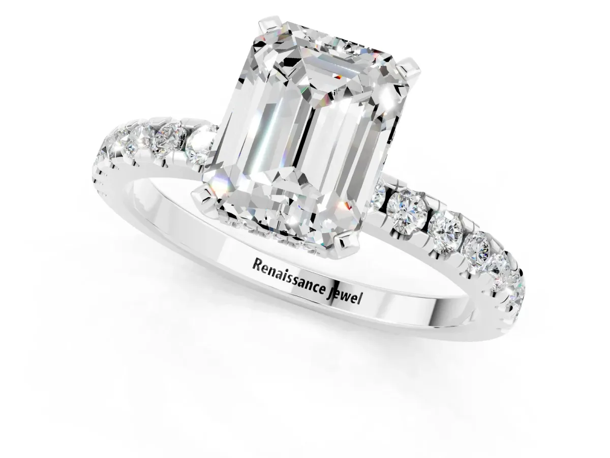 Emerald Cut Moissanite Solitaire Ring with Round Pavé Band and Four-Prong Setting Silver