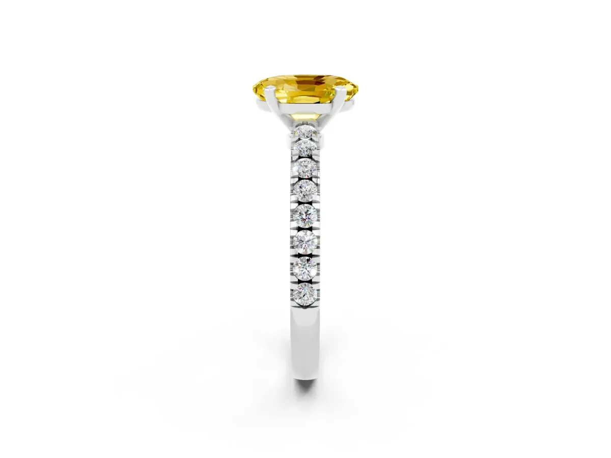 Oval Cut Solitaire Yellow Sapphire with Pavé Band and Four-Prong Setting Silver
