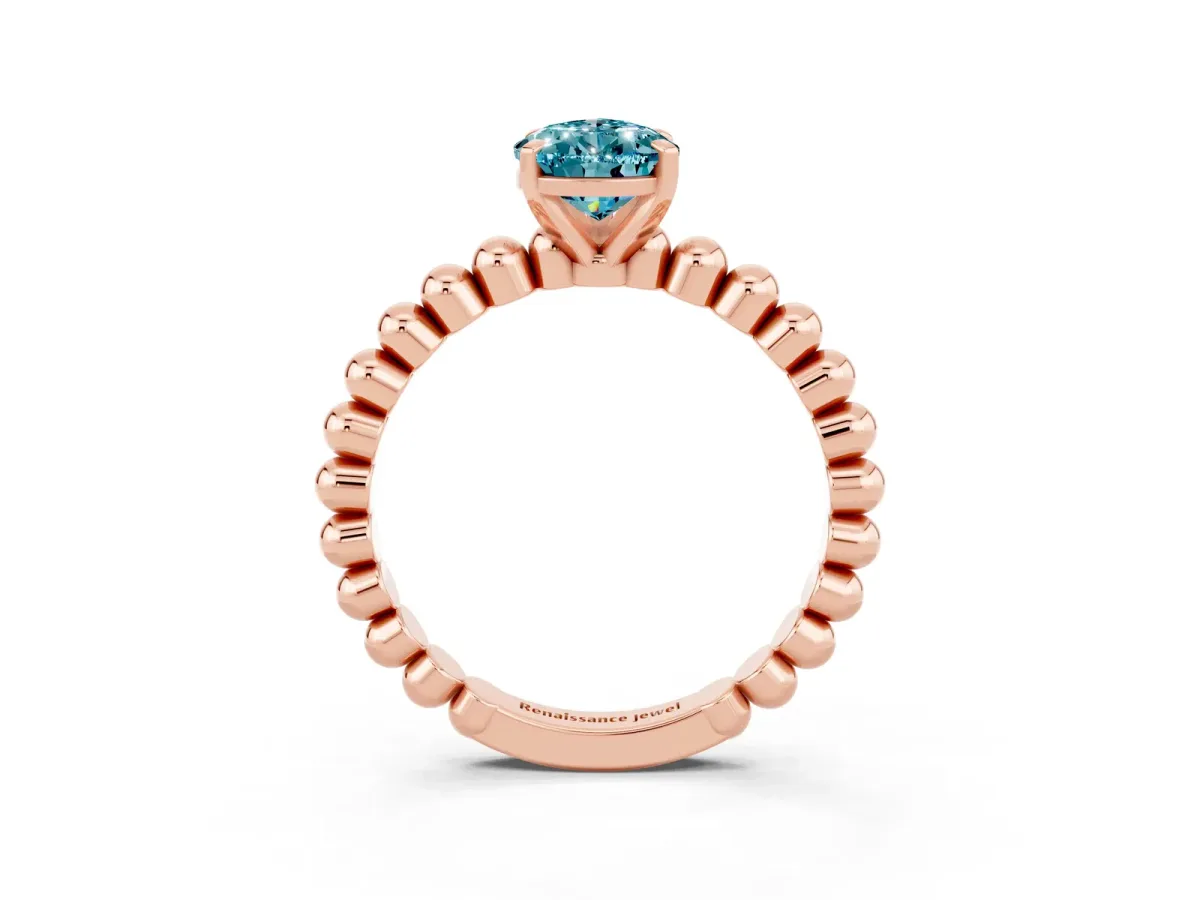 Pear Cut Blue Topaz Solitaire Ring with Beaded Band and Prong Setting Rose gold