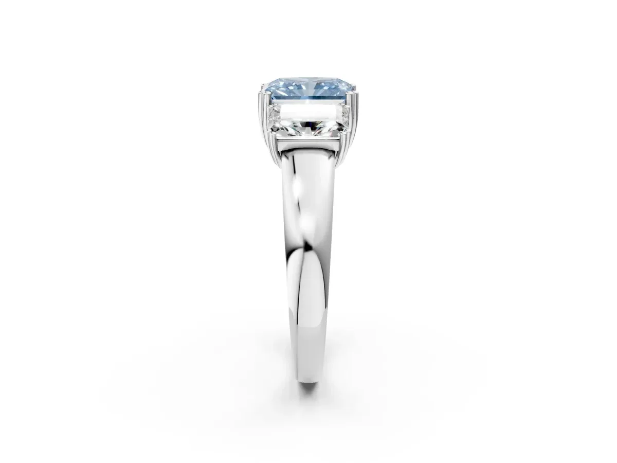 Fancy Blue Three-Stone Radiant Cut Cut Diamond Ring with Channel Set Band and Four-Prong Setting Silver
