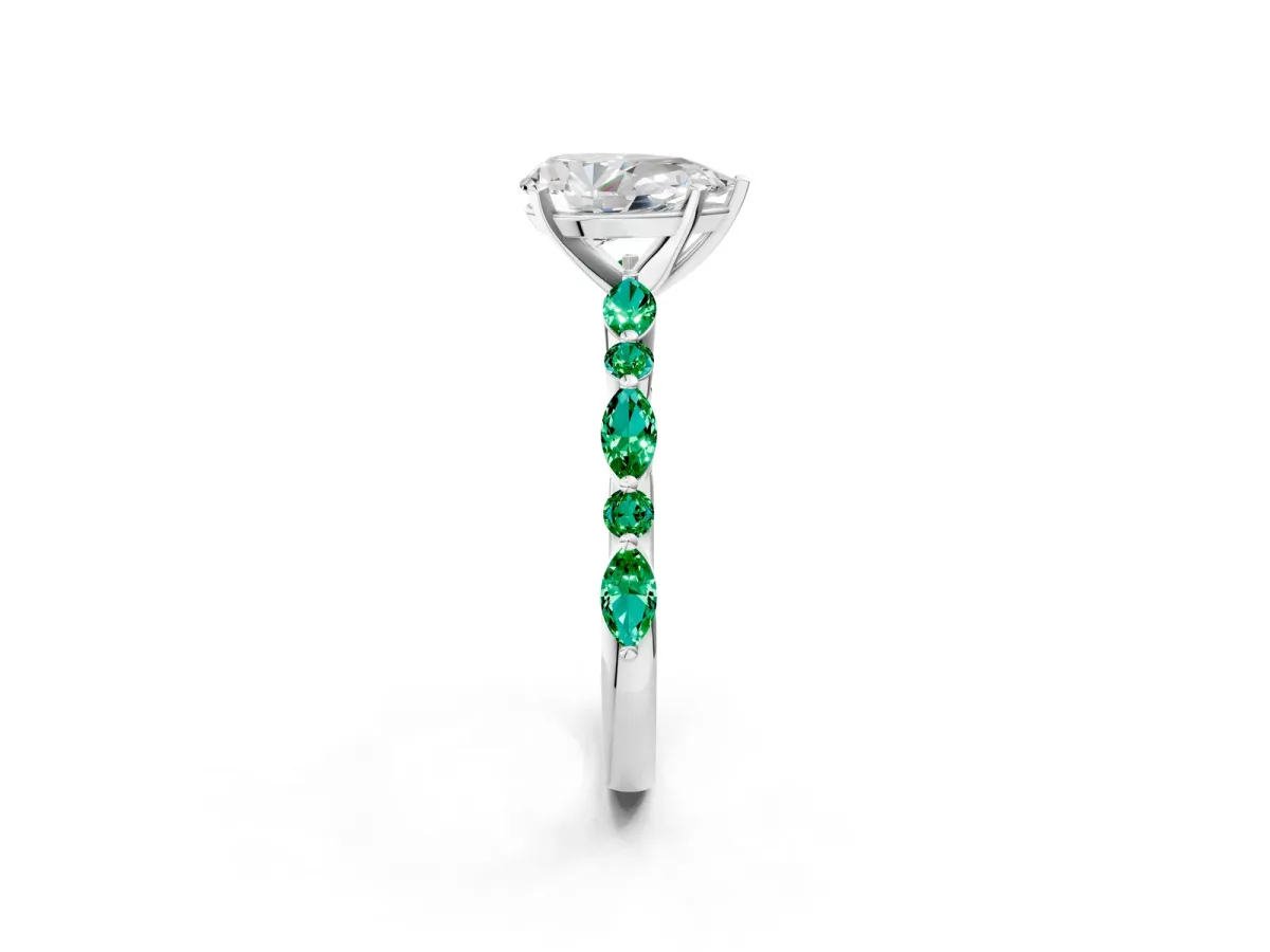 Pear Cut Diamond Ring with Marquise and Round Emerald Side Stones and Four-Prong Setting Silver