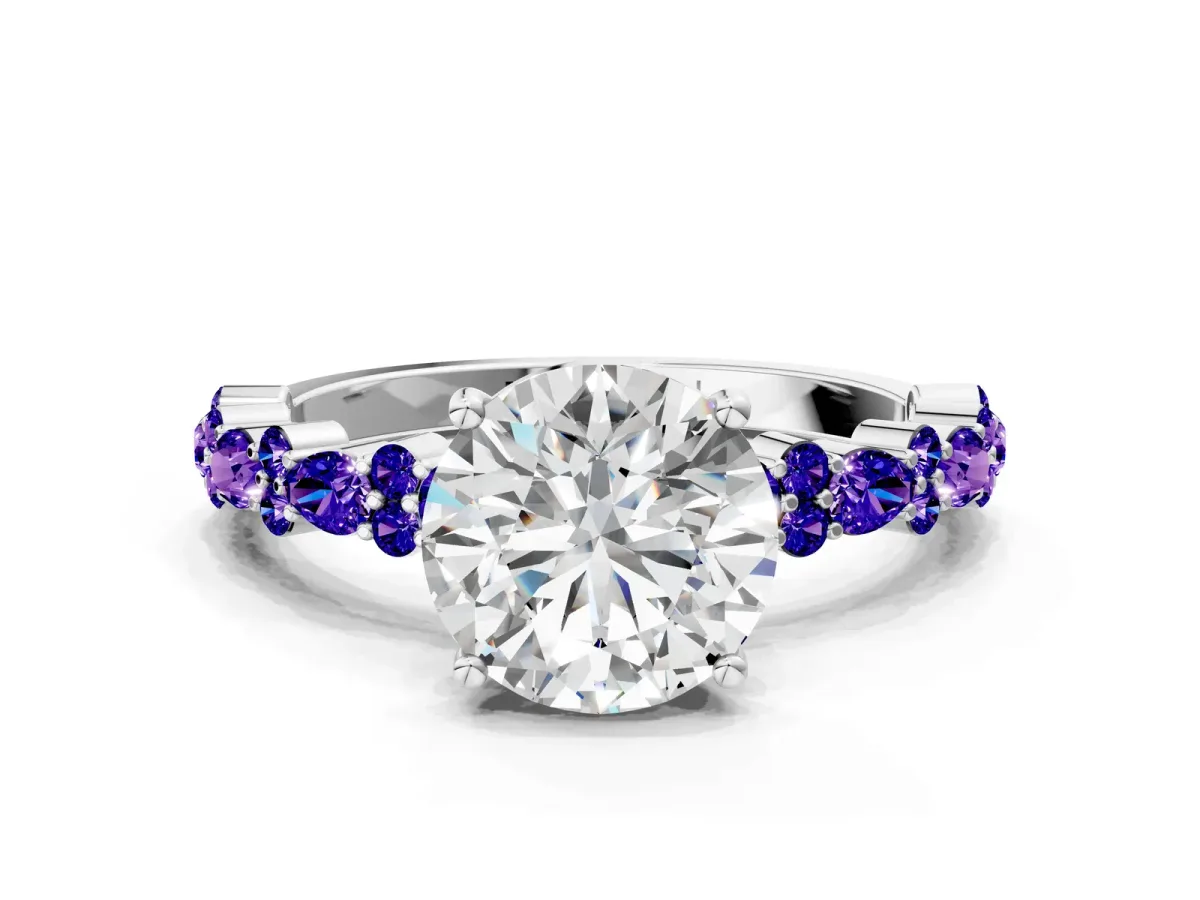 Round Cut Diamond Side Stone Solitaire Ring with Round Tanzanite and Four-Prong Setting Silver