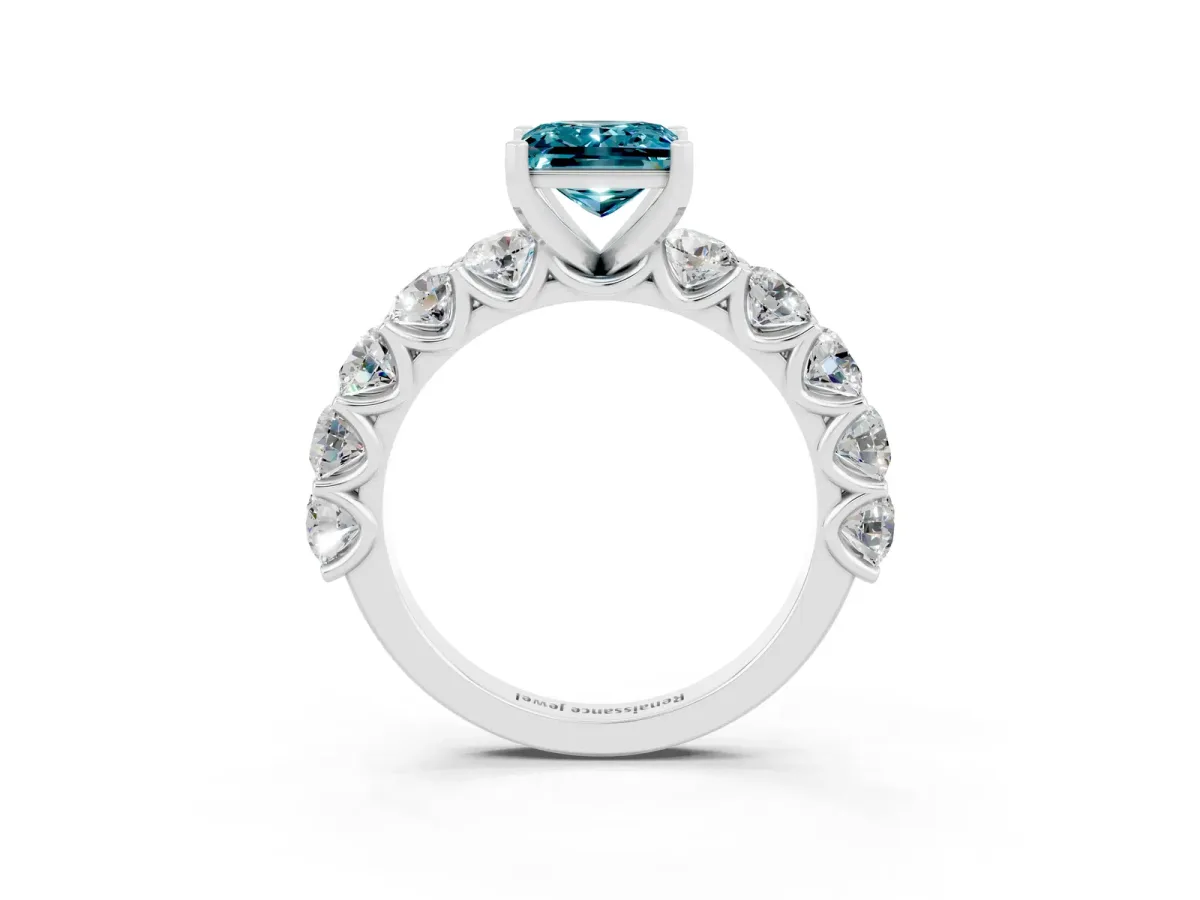 Princess Cut Blue Topaz Prong Setting with Side Stones on a Pave Band Silver