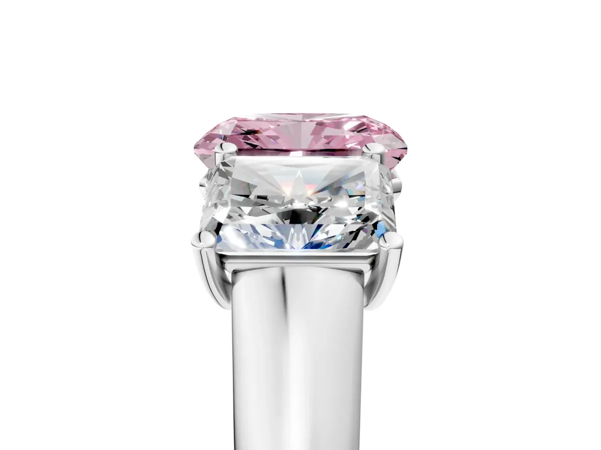 Fancy Pink Radiant Cut Three-Stone Diamond Ring with Prong Setting on a Classic Band Platinum