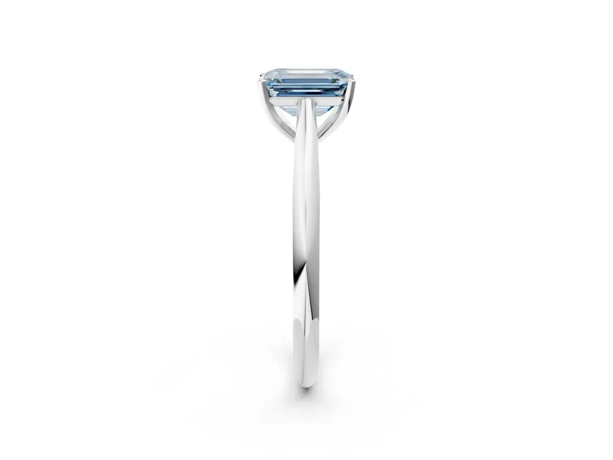 Fancy Blue Emerald Cut Diamond Solitaire Engagement Ring with Cathedral Setting and Four-Prong Mount White gold