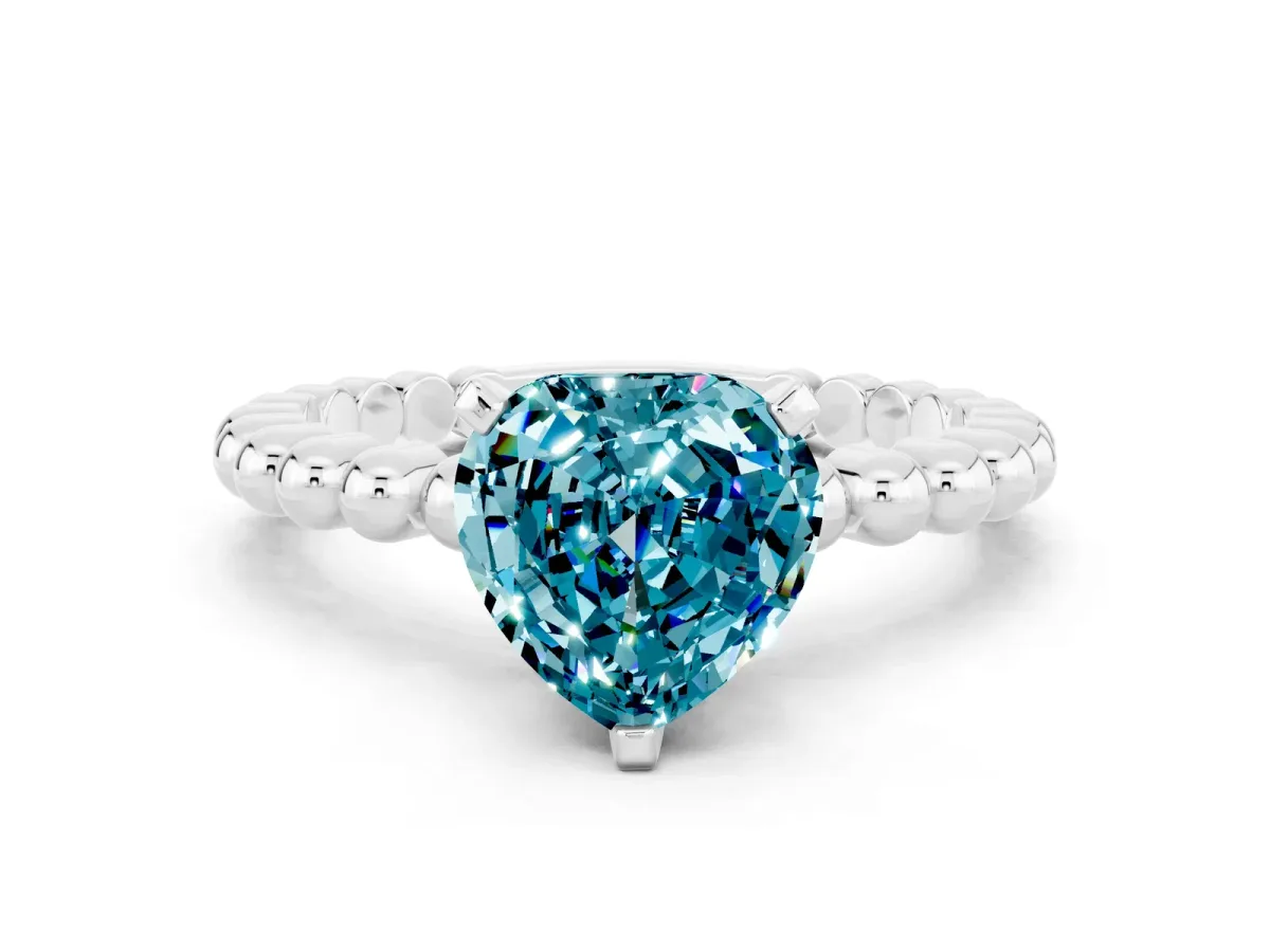 Heart Cut Blue Topaz Solitaire Ring with Beaded Band and Prong Setting Silver