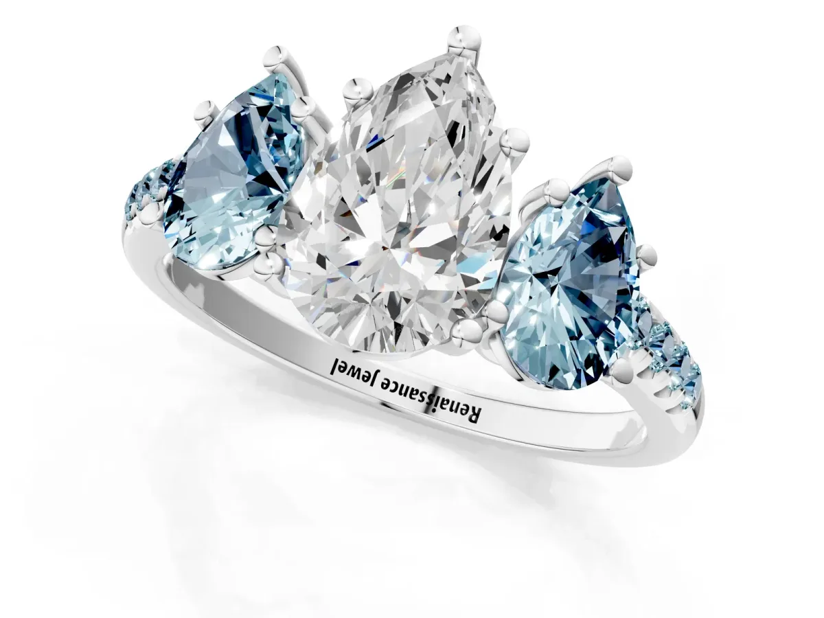 Three-Stone Pear Cut Diamond Ring with Round Aquamarine Pavé Band and Prong Setting Silver