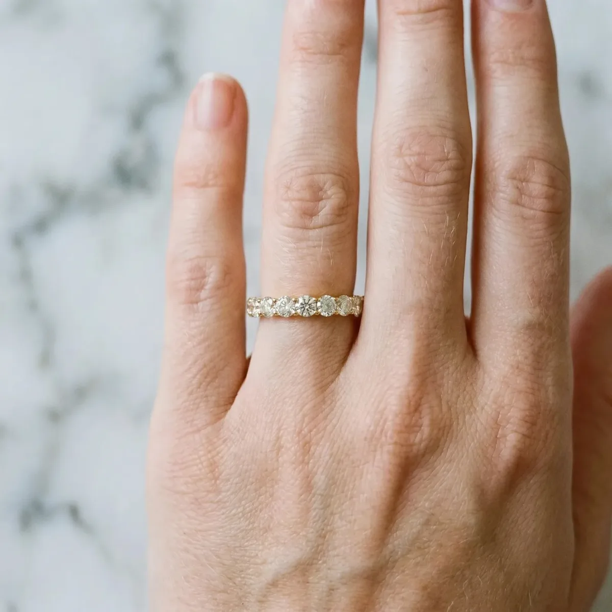 Round Diamond Eternity Band with Pavé Setting and Shared Prong Yellow gold