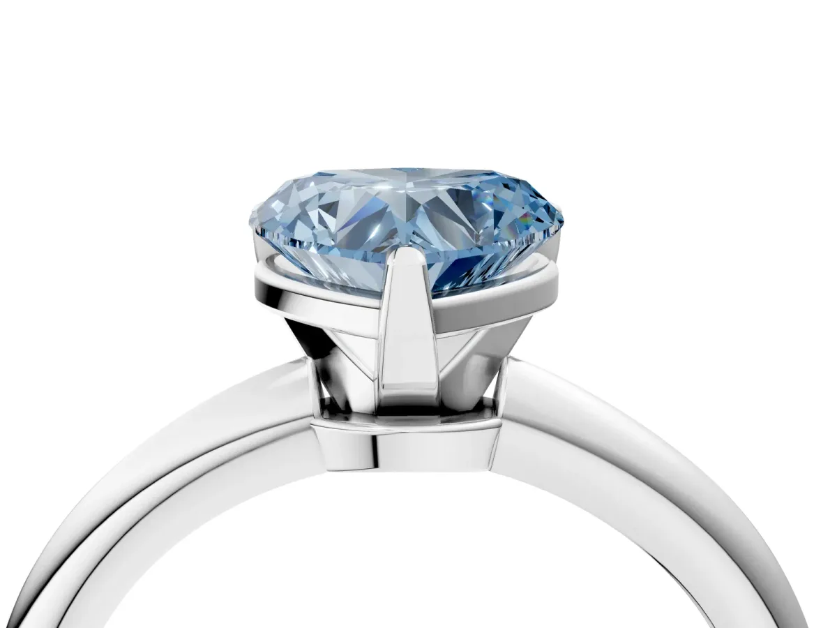 Fancy Blue Heart Cut Diamond Solitaire Ring with Six-Prong Setting and Classic Band Silver