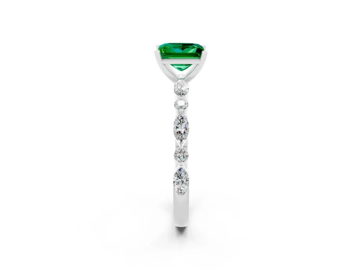 Princess Cut Emerald Ring with Marquise and Round Side Stones and Four-Prong Setting Silver