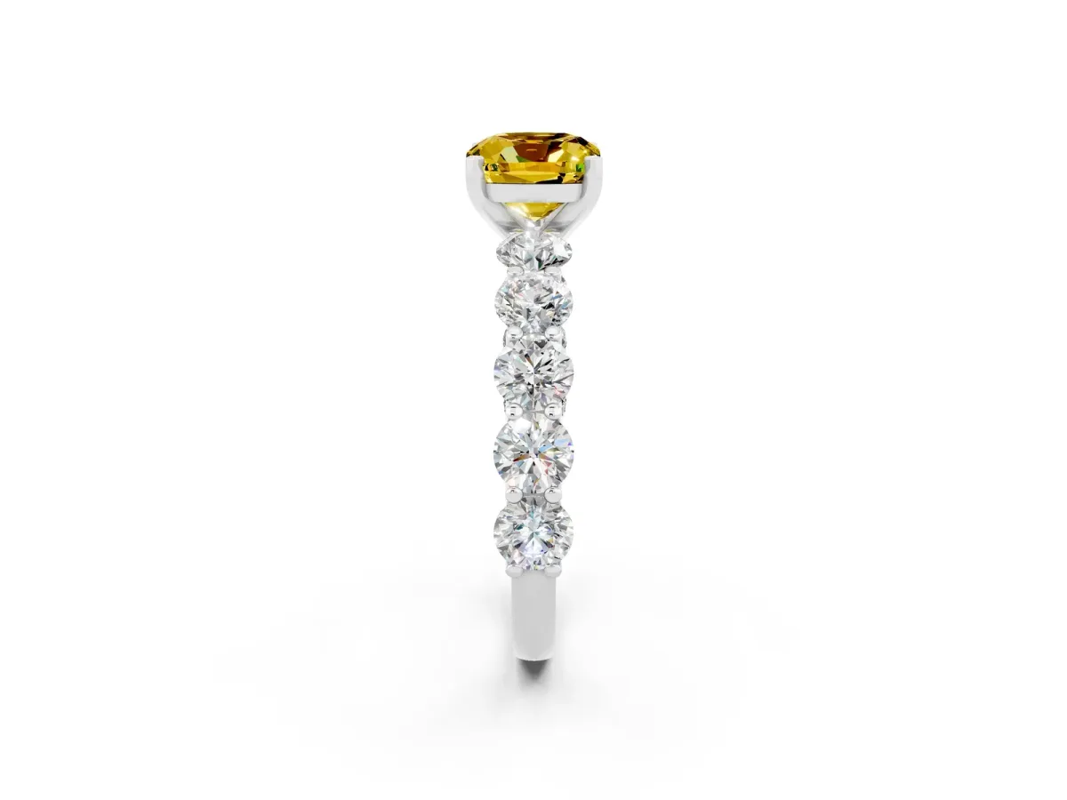 Cushion Cut Yellow Sapphire Prong Setting with Side Stones on a Pave Band Silver
