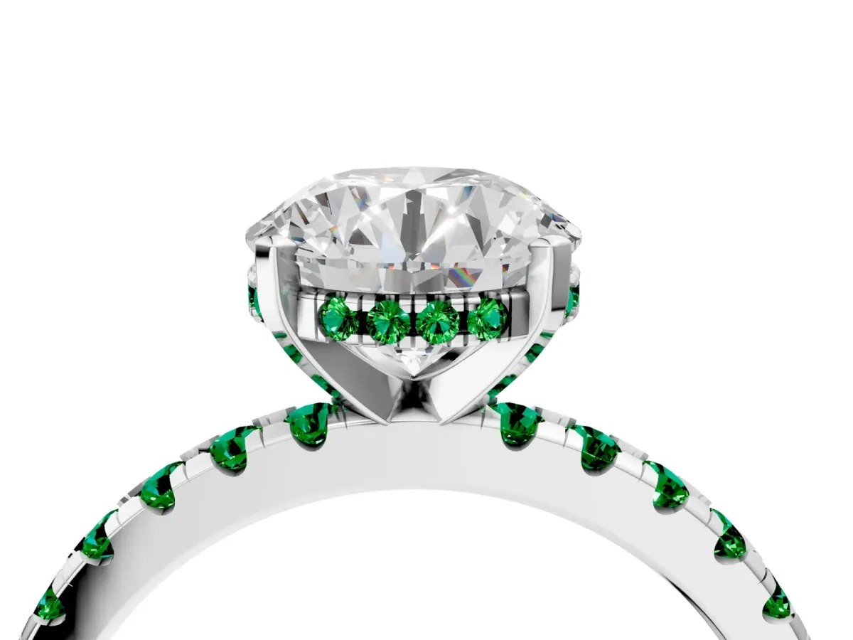 Round Cut Diamond Solitaire Ring with Round Emerald Pavé Band and Four-Prong Setting Silver