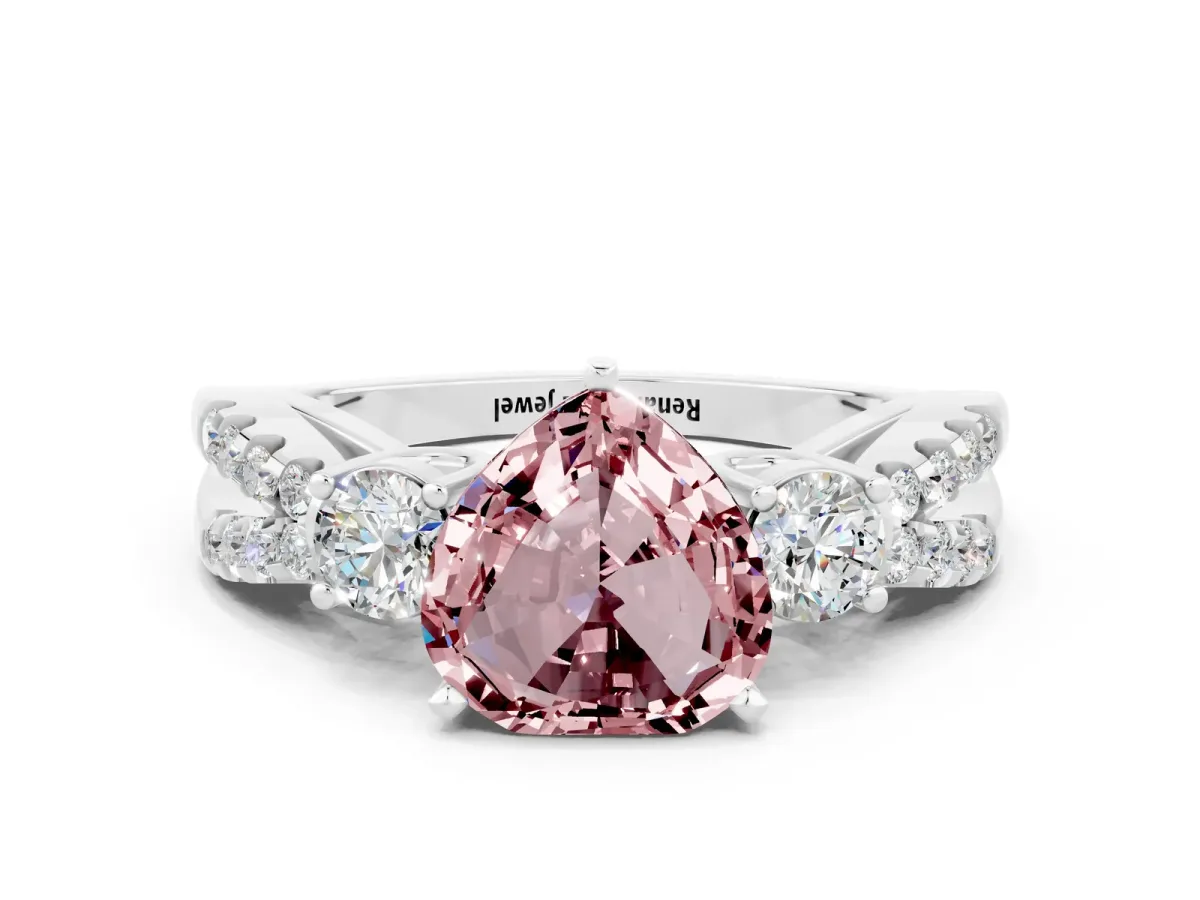 Heart Cut Morganite Three-Stone Ring with Pavé Split Shank and Four-Prong Setting White gold