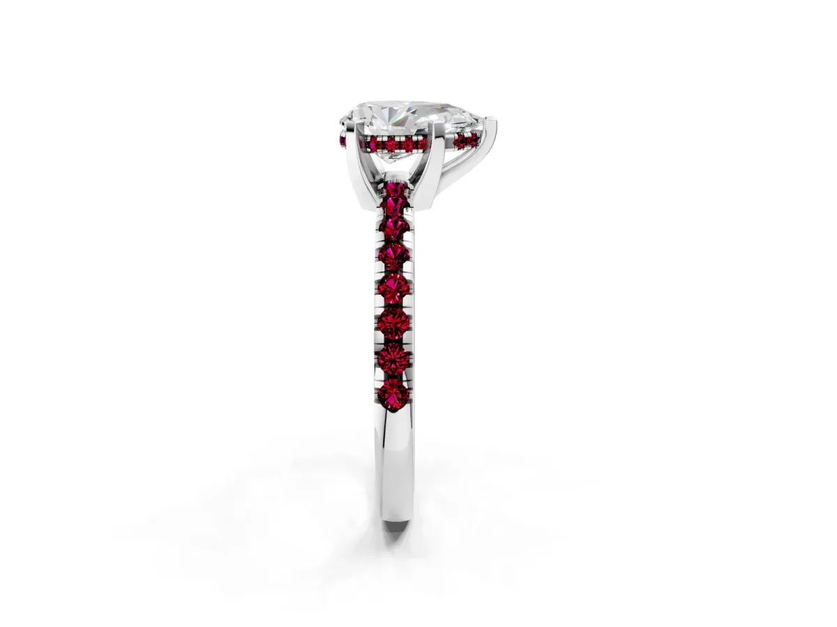 Pear Cut Diamond Solitaire Ring with Round Garnet Pavé Band and Four-Prong Setting Silver