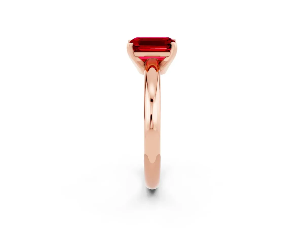 Emerald Cut Ruby Solitaire Engagement Ring with Round Band and Four-Prong Setting Rose gold