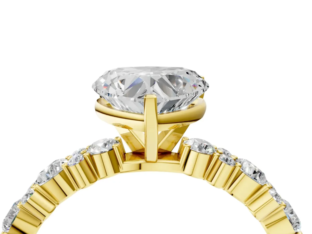 Heart Cut Diamond Side Stone Solitaire Ring with Round and Four-Prong Setting Yellow gold