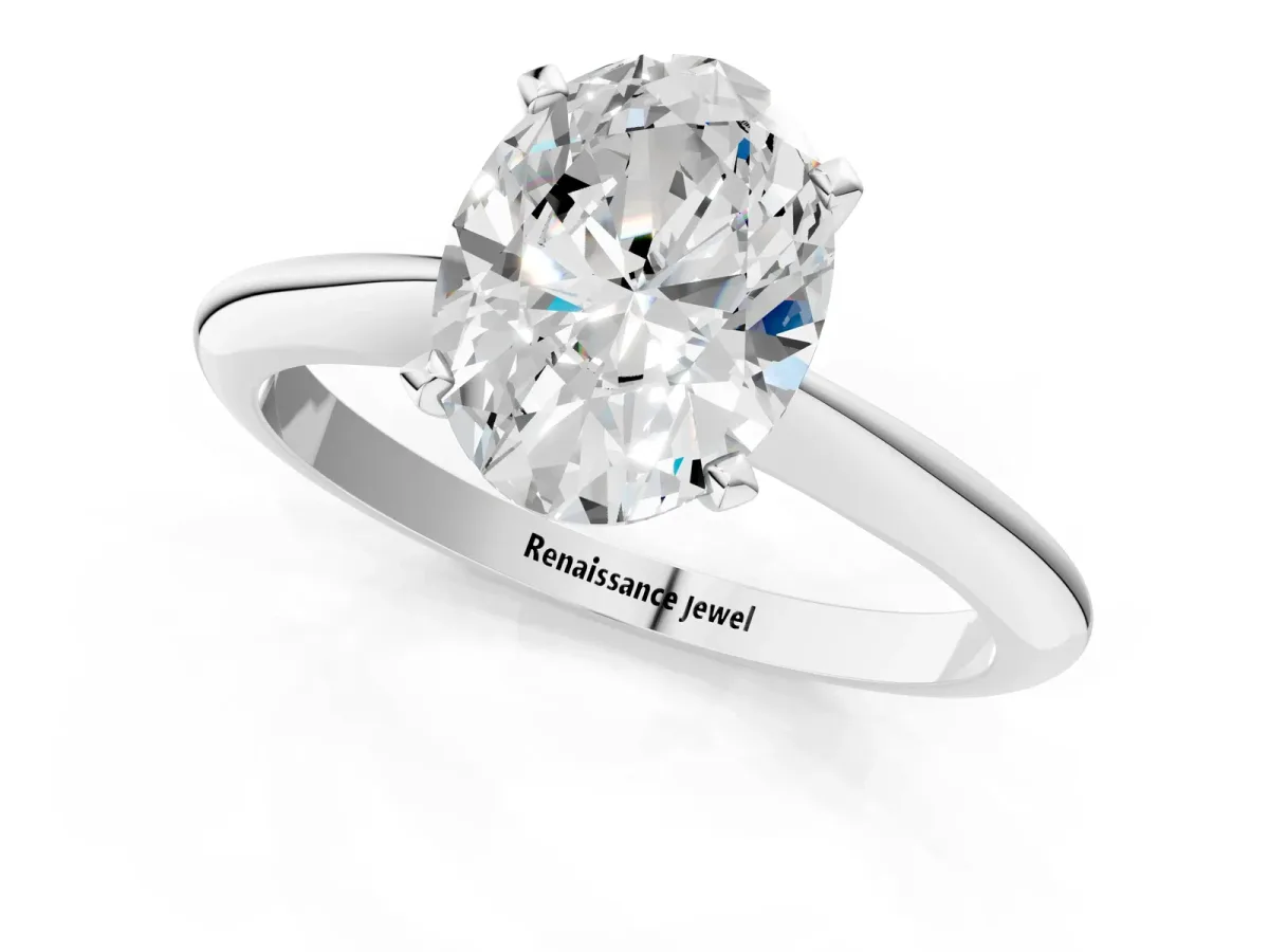 Oval Cut Diamond Solitaire Engagement Ring with Classic Band and Four-Prong Setting Silver