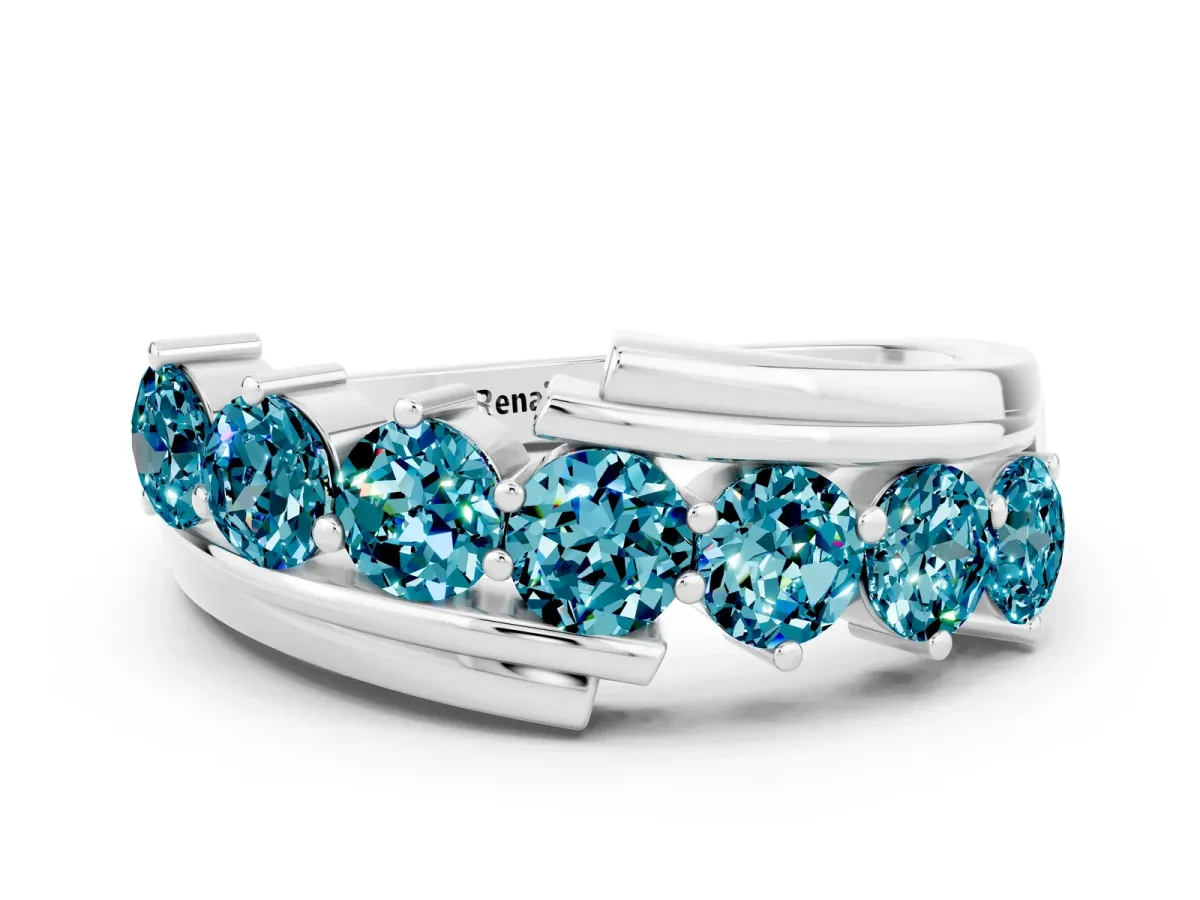 Round Blue Topaz Wave Band with Channel and Shared Prong Setting Silver