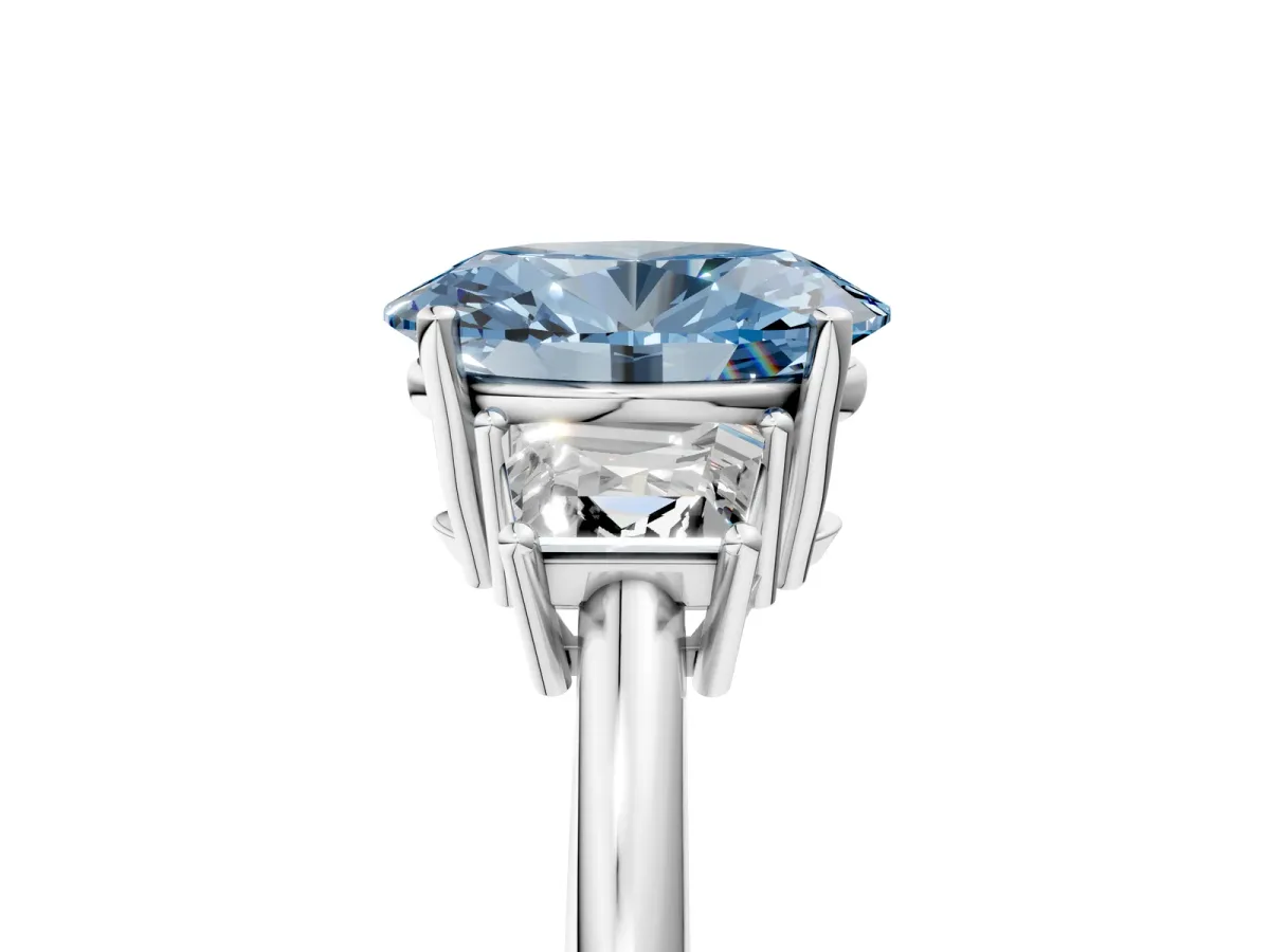 Fancy Blue Oval Cut Diamond Three-Stone Ring with Trapezoid Side Stones and Prong Setting White gold