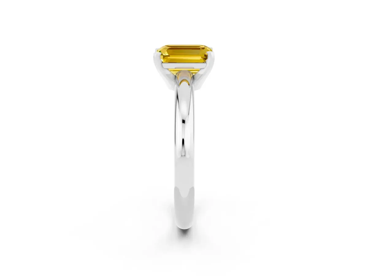 Emerald Cut Yellow Sapphire Solitaire Engagement Ring with Round Band and Four-Prong Setting Silver