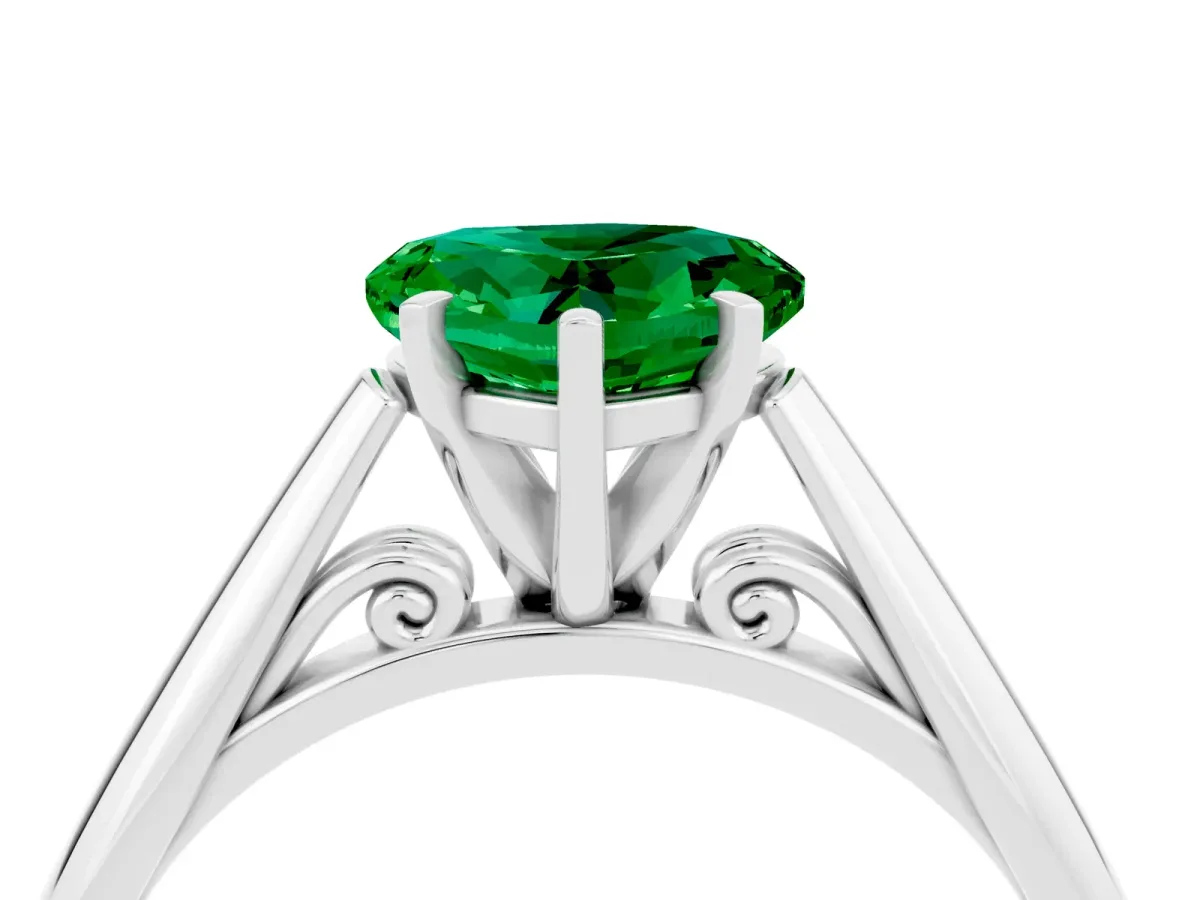 Heart Cut Emerald Solitaire Engagement Ring with Cathedral Setting and Four-Prong Mount White gold
