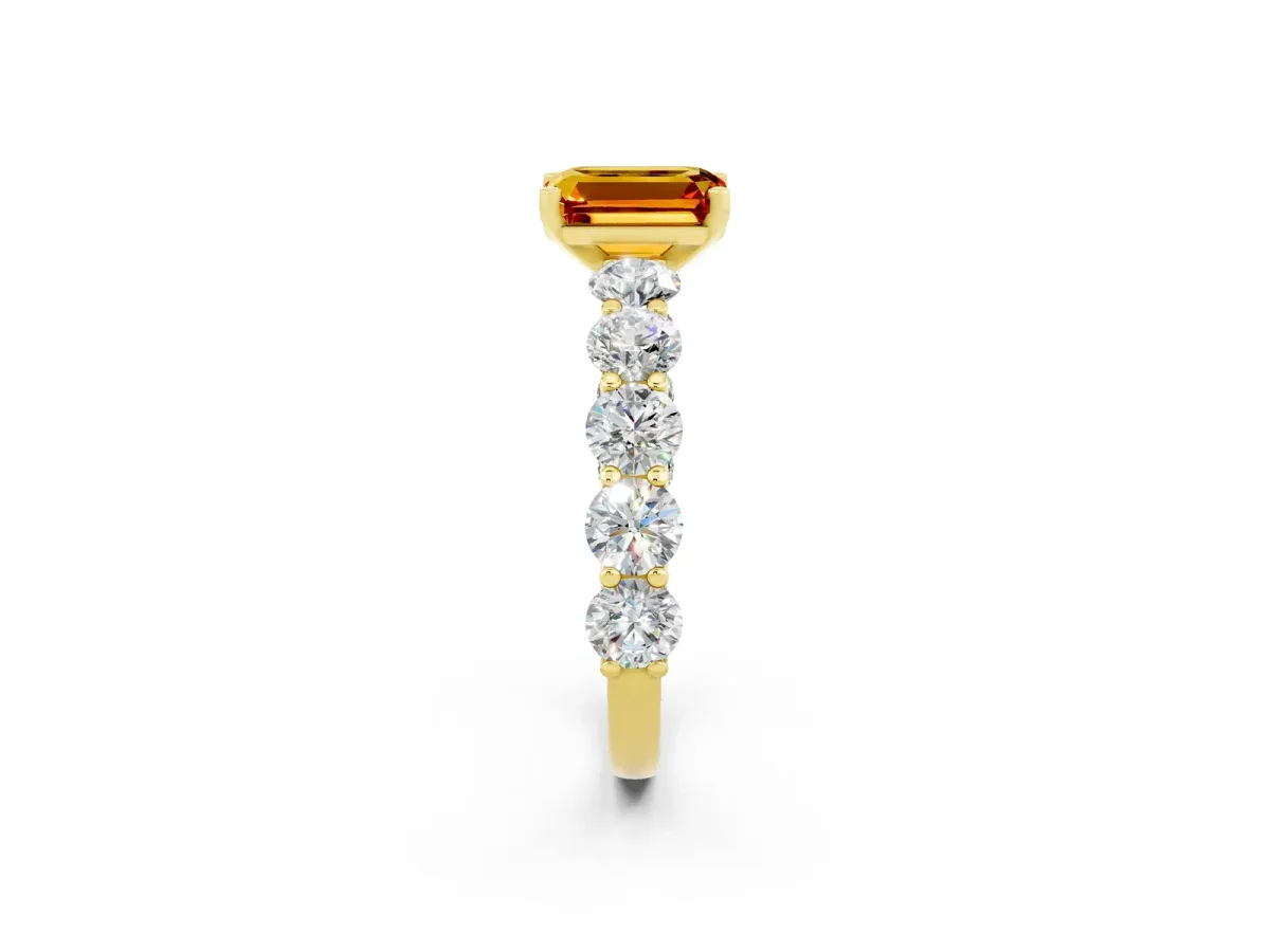 Emerald Cut Citrine Prong Setting with Side Stones on a Pave Band Yellow gold