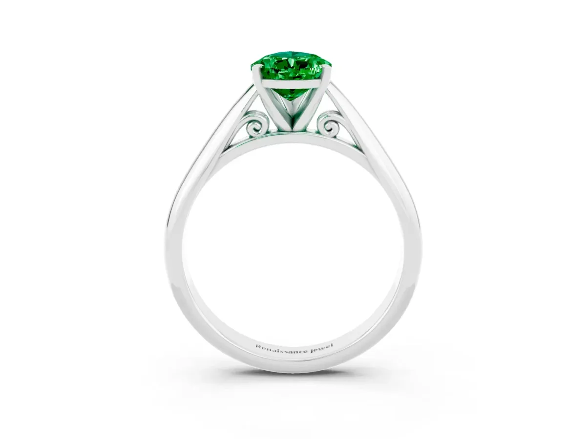 Pear Cut Emerald Solitaire Engagement Ring with Cathedral Setting and Four-Prong Mount White gold