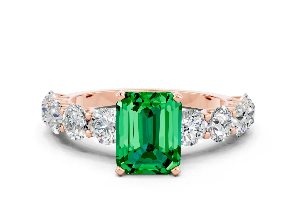 Emerald Cut Emerald Prong Setting with Side Stones on a Pave Band Rose gold