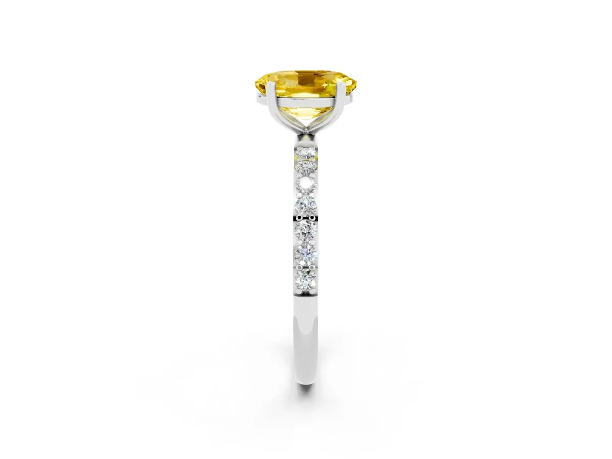 Oval Cut Yellow Sapphire Solitaire Ring with Round Pavé Band and Prong Setting Silver