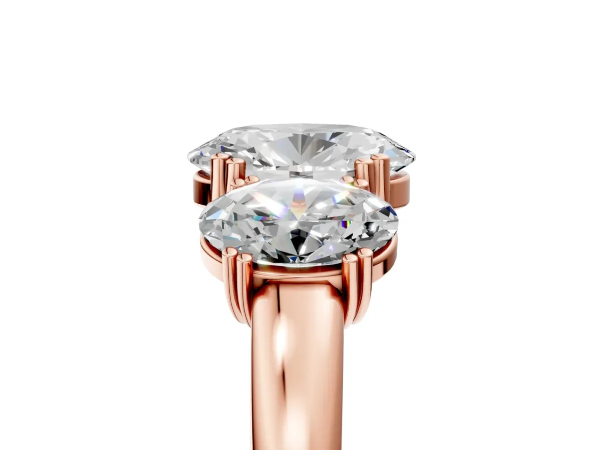 Three-Stone Oval Cut Cut Diamond Ring with Channel Set Band and Four-Prong Setting Rose gold