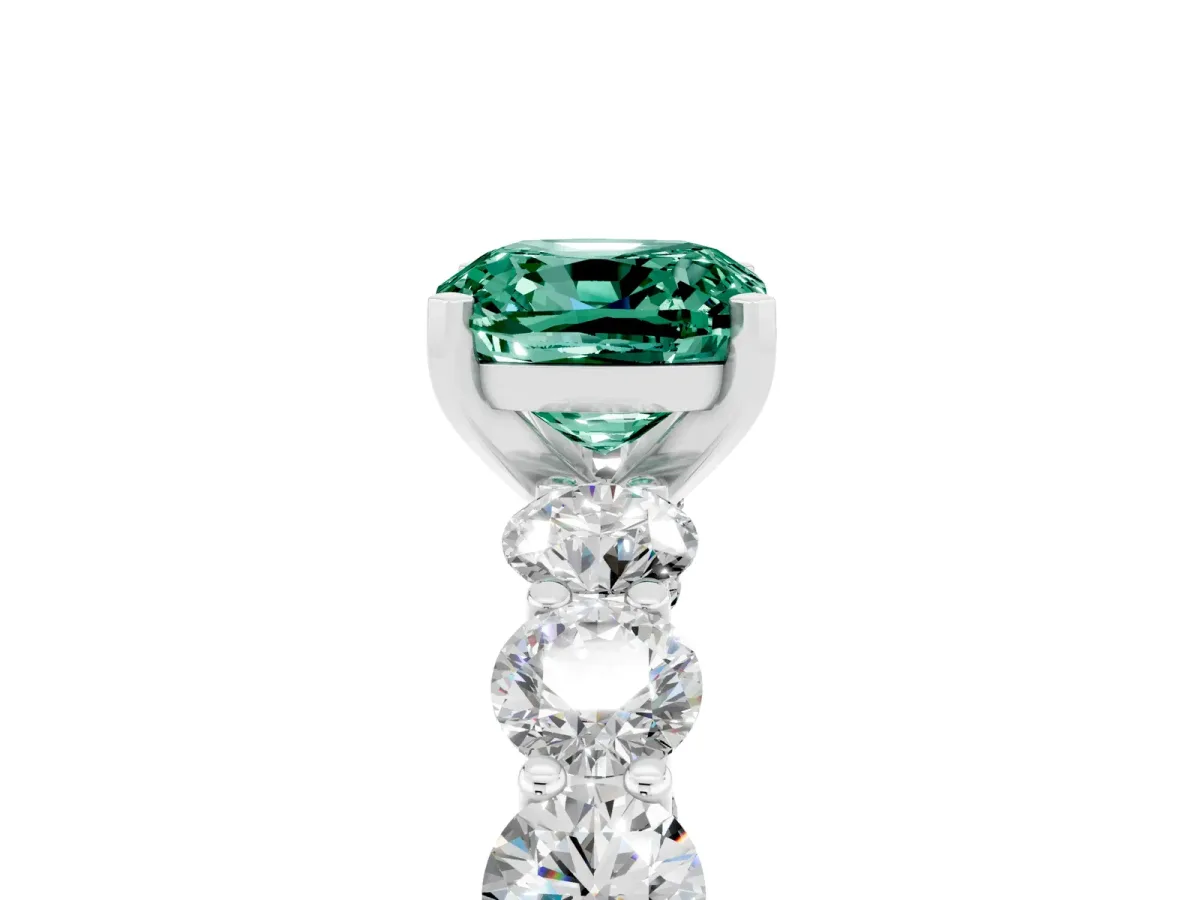 Cushion Cut Green Sapphire Prong Setting with Side Stones on a Pave Band Silver