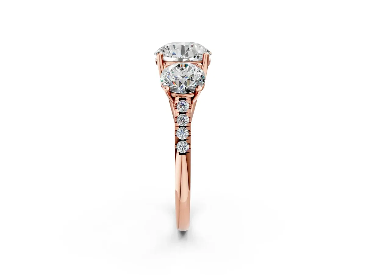 Three-Stone Round Cut Diamond Ring with Round Pavé Band and Prong Setting Rose gold