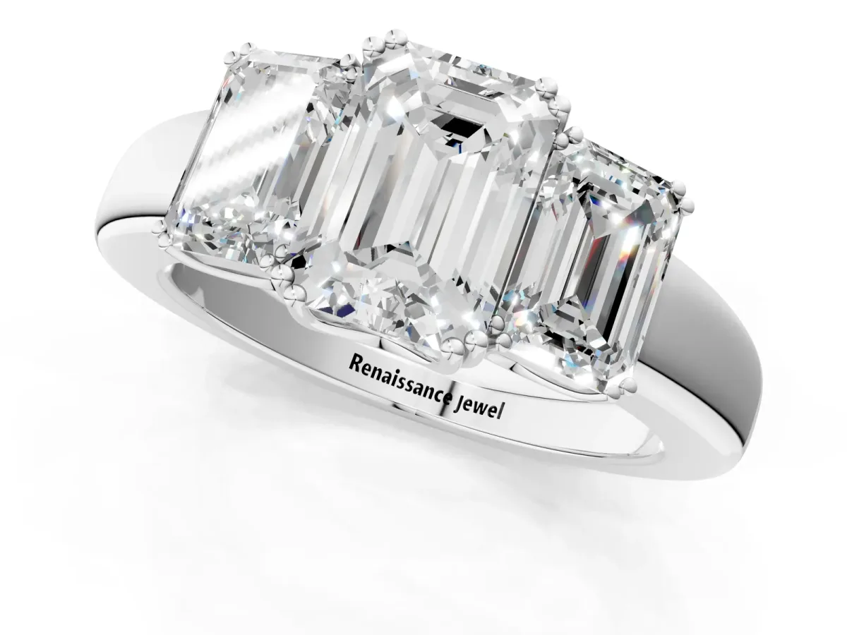 Three-Stone Emerald Cut Cut Diamond Ring with Channel Set Band and Four-Prong Setting White gold