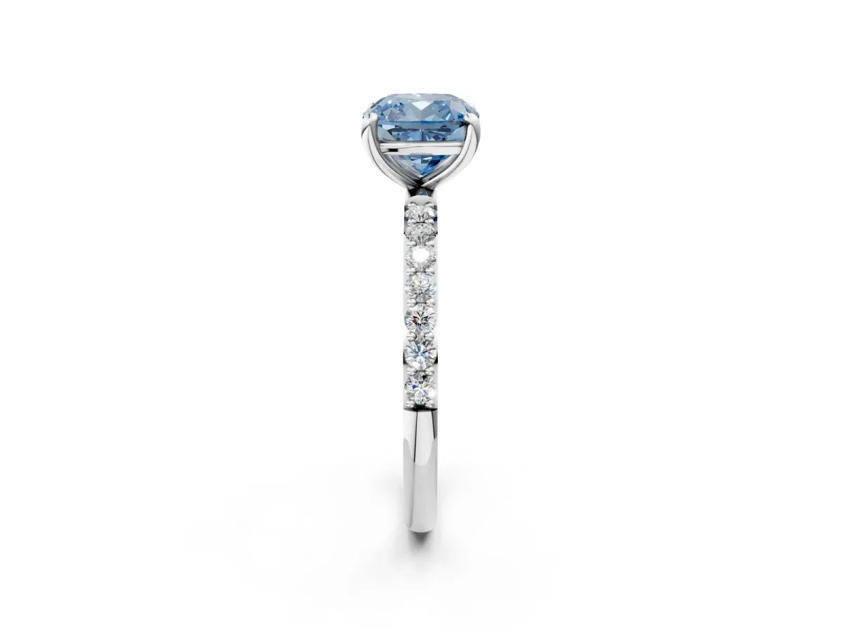 Fancy Blue Cushion Cut Diamond Solitaire Ring with Round Pavé Band and Prong Setting Platinum