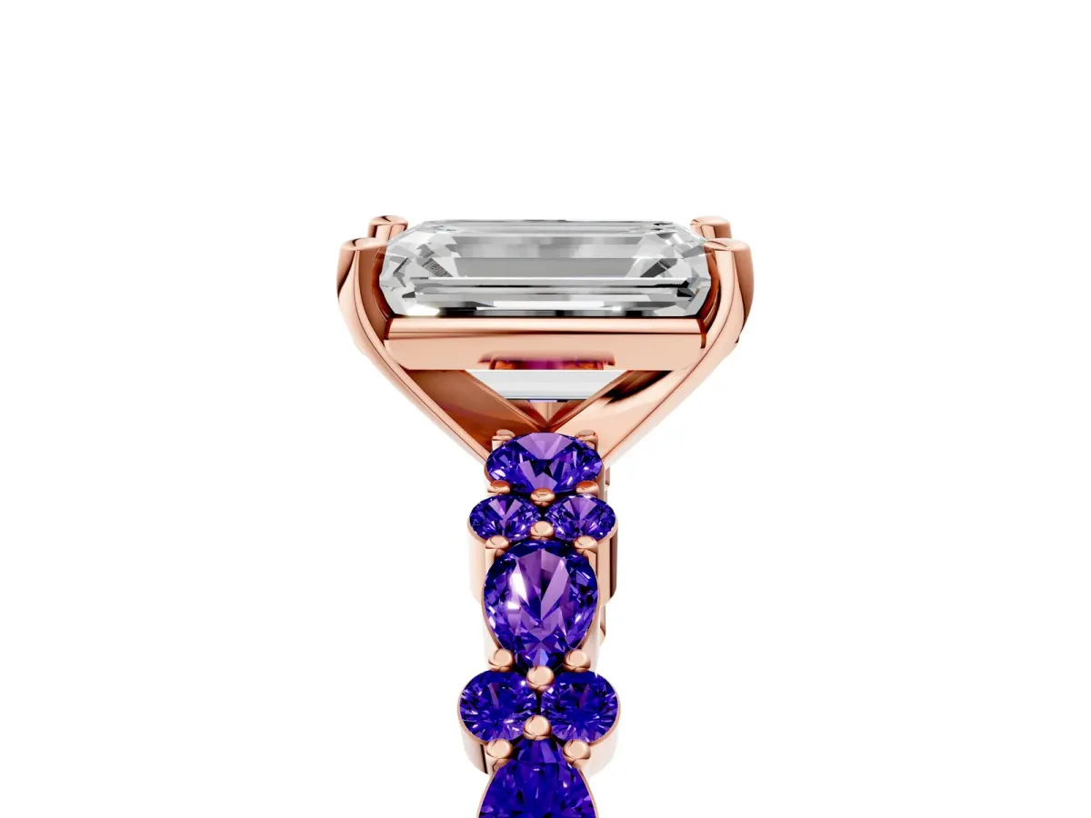 Emerald Cut Diamond Side Stone Solitaire Ring with Round Tanzanite and Four-Prong Setting Rose gold