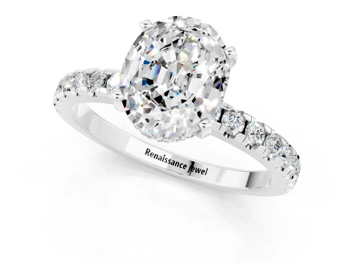 Oval Cut Moissanite Solitaire Ring with Round Pavé Band and Four-Prong Setting Silver