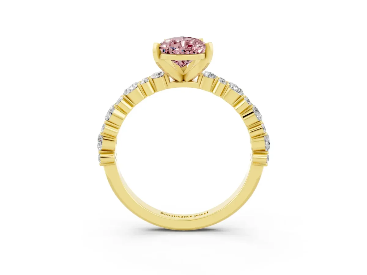 Pear Cut Morganite Side Stone Solitaire Ring with Round and Four-Prong Setting Yellow gold