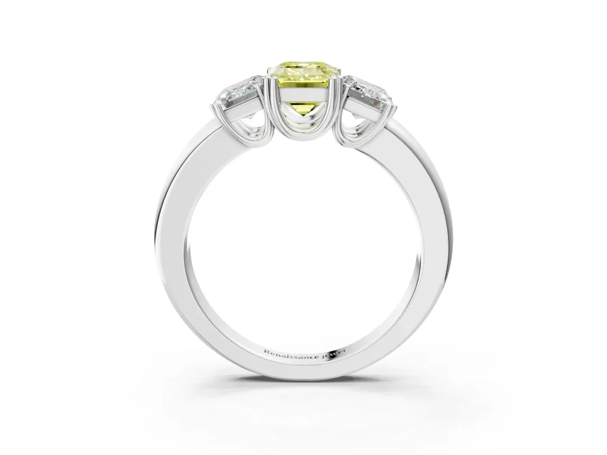 Fancy Yellow Three-Stone Emerald Cut Cut Diamond Ring with Channel Set Band and Four-Prong Setting Silver