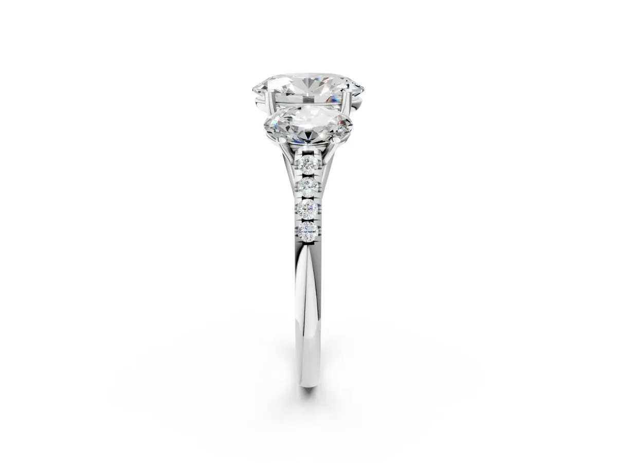 Three-Stone Oval Cut Diamond Ring with Round Moissanite Pavé Band and Prong Setting Silver