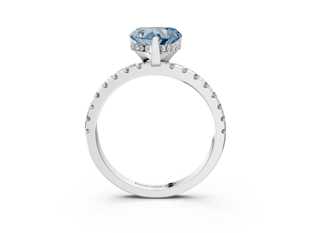 Fancy Blue Heart Cut Diamond Solitaire Ring with Round Pavé Band and Four-Prong Setting Silver