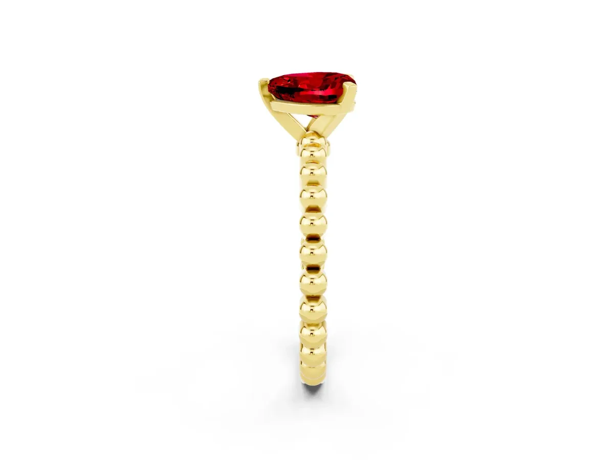 Heart Cut Ruby Solitaire Ring with Beaded Band and Prong Setting Yellow gold