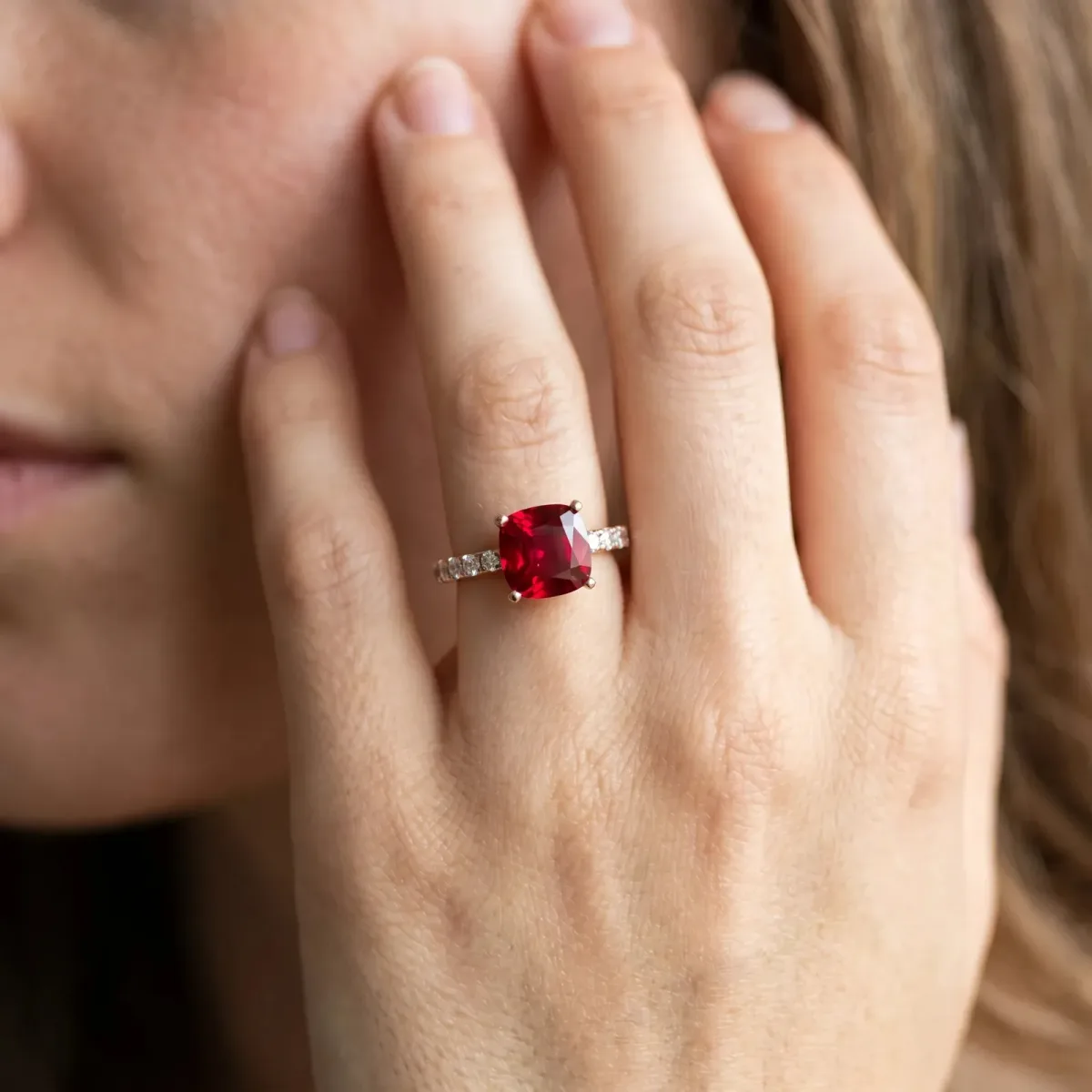 Cushion Cut Ruby Solitaire Ring with Round Pavé Band and Four-Prong Setting Rose gold