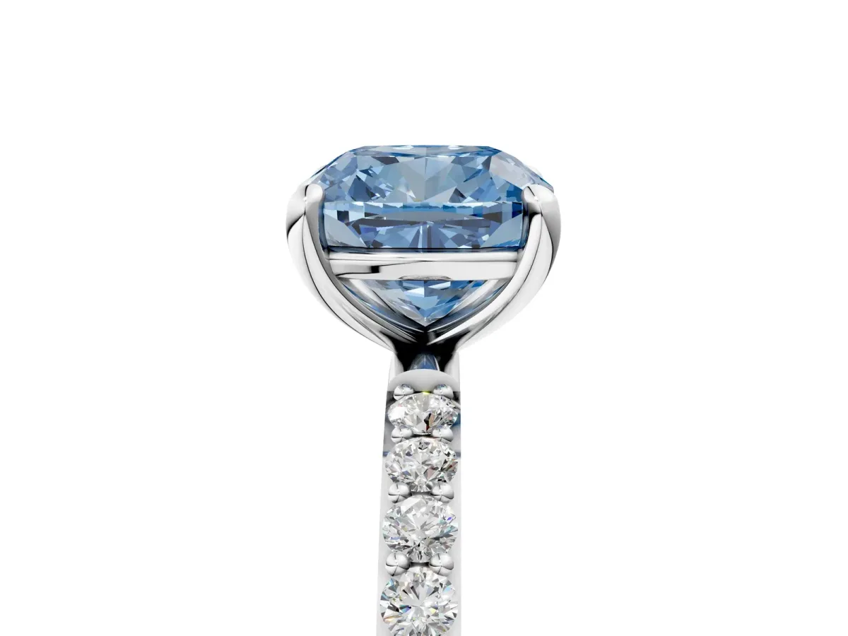 Fancy Blue Cushion Cut Diamond Solitaire Ring with Round Pavé Band and Prong Setting Platinum
