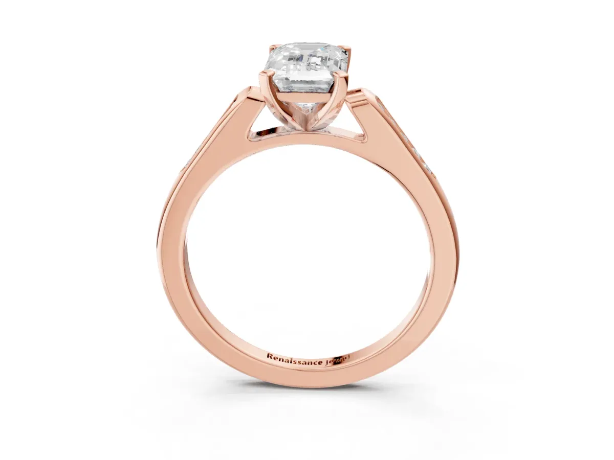 Emerald Cut Diamond Solitaire Ring with Channel Set Round Band and Prong Setting Rose gold