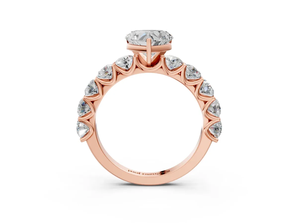 Heart Cut Diamond Prong Setting with Side Stones on a Pave Band Rose gold