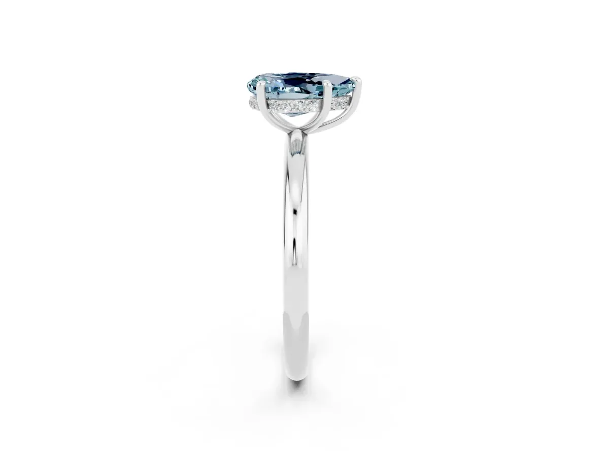Pear Cut Aquamarine Solitaire Ring with Thin Band and Four-Prong Setting Silver