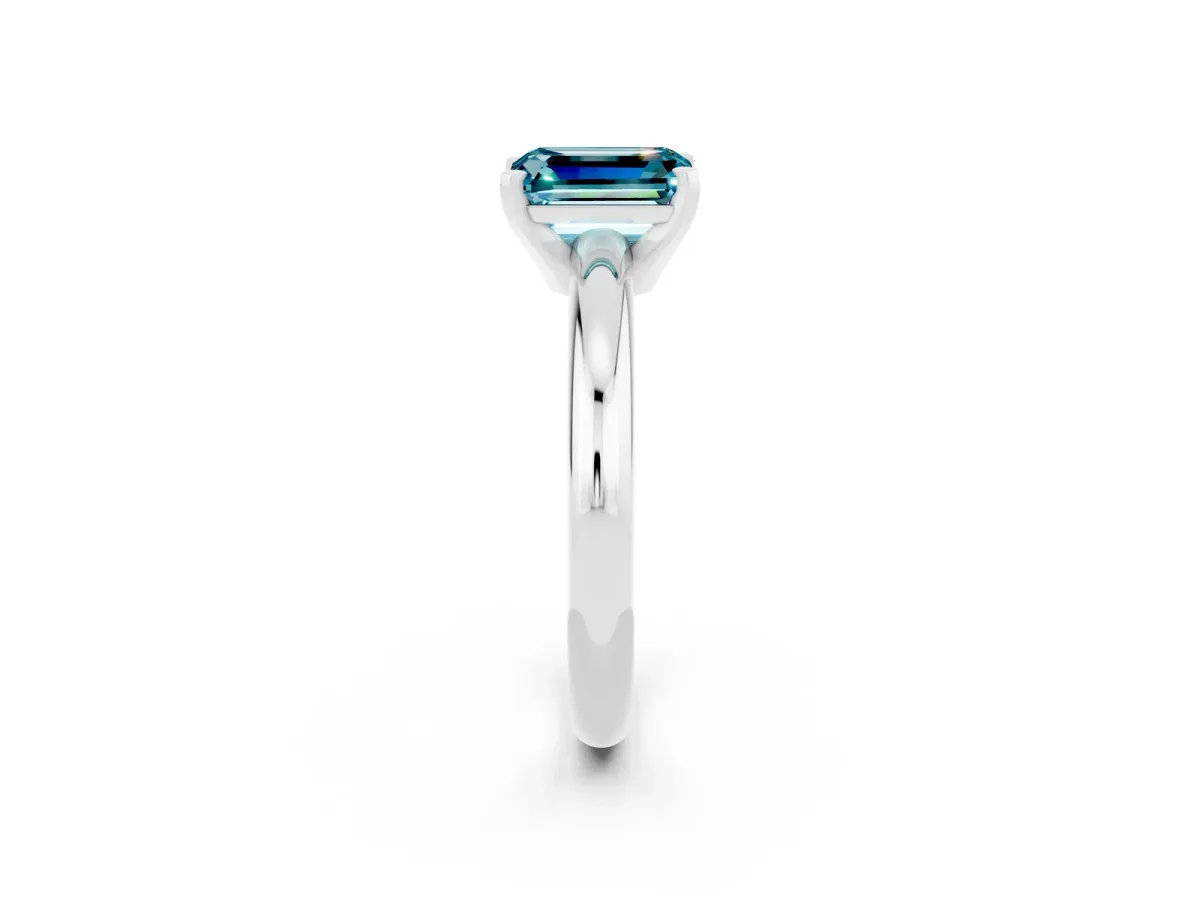 Emerald Cut Blue Topaz Solitaire Engagement Ring with Round Band and Four-Prong Setting Silver