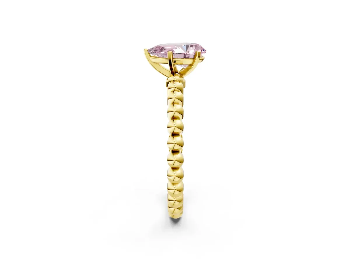 Fancy Pink Pear Cut Diamond Solitaire Ring with Beaded Band and Prong Setting Yellow gold