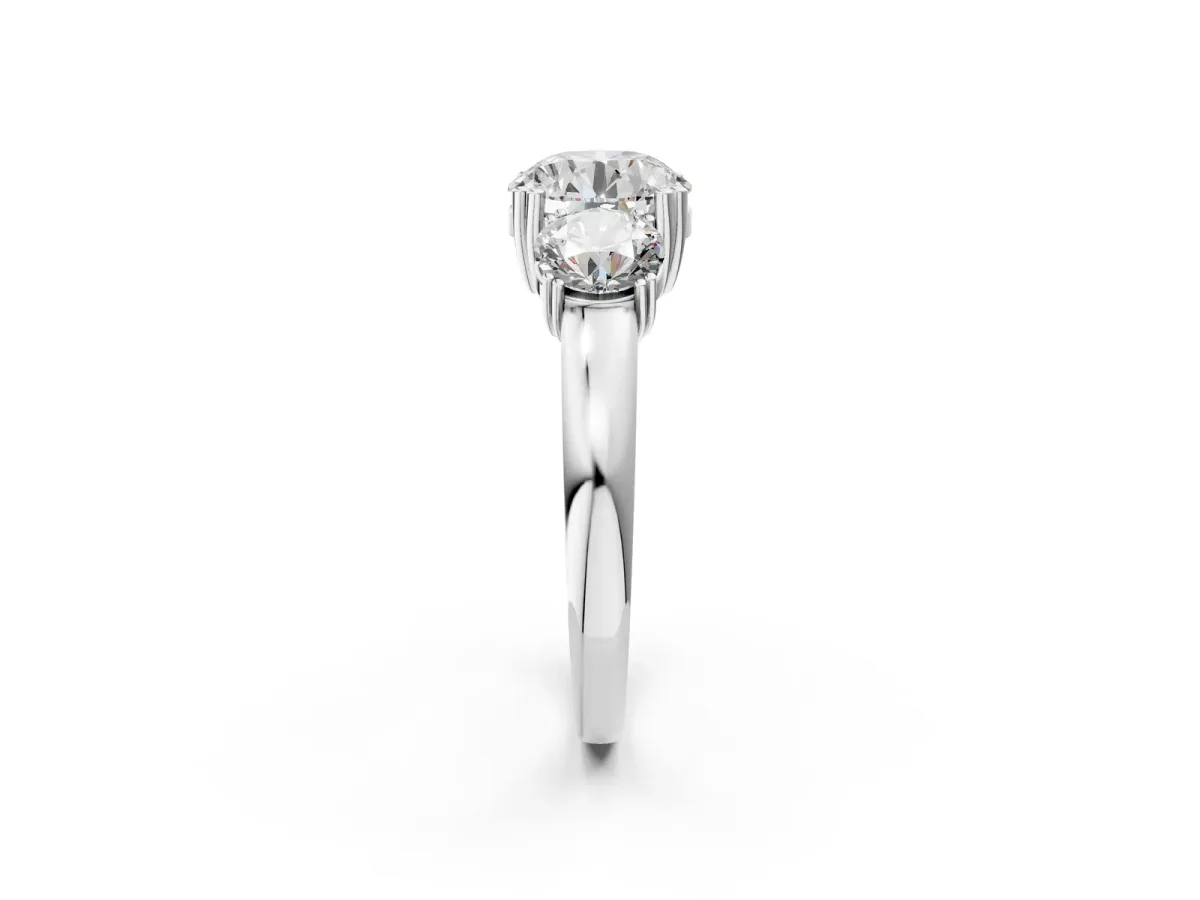 Three-Stone Round Cut Cut Diamond Ring with Channel Set Band and Four-Prong Setting White gold